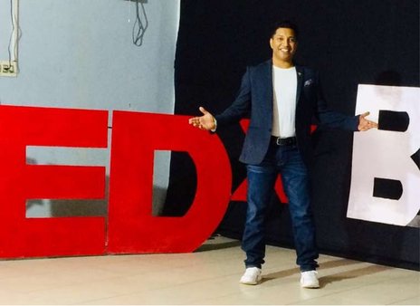 Mihir Koltharkar on stage at his second TEDx talk