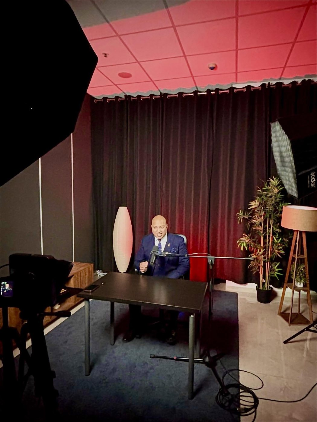 Mihir Koltharkar recording an online sales and negotiation training session in studio